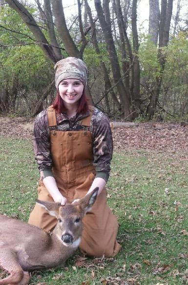 Sophomore Hailey Fisher, sitting in her tree stand since 5 a.m. finally sees the deer she has been waiting for and takes the shot an hour later. I was very happy, Fisher said about the second button buck she had gotten in the past three years of hunting.