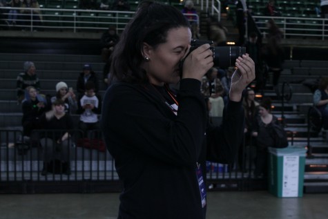 Kightlinger took out her camera and begins snapping pictures. "I took pictures of everyone coming in. People were sitting on the ground, talking about politics, and interacting."