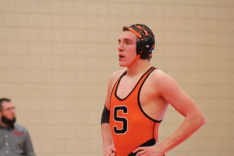 During his 170-pound match
at an away meet at Perry
High School, Best waits for
his match to begin after the
first period. The Perry meet
also included Webberville
High School. Best went on
to beat the Webberville
wrestler by pinning him in
the second period to earn
his team six points.