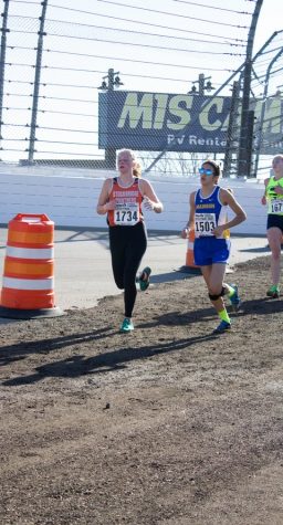 Varsity cross country places 4th in States