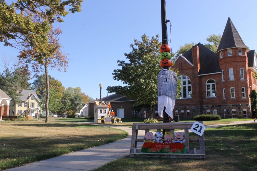 On the west side of the town hall, families and business decorate light poles with a theme. Charlie Brown the Great Pumpkin and spooky skeleton construction workers surround some of the light pole in town. 
