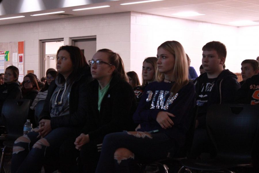Listening to the vaping presentation, juniors Hannah Smith, Jordan Meyers, and Isabelle Bliss listen attentively. A rise in vaping episodes in secluded spaces in the school urged administration to hold an educational session.