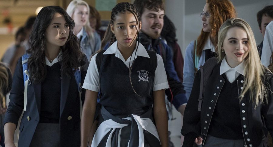 A scene from the movie The Hate U Give, in which Starr Carter (Amandla Stenberg) with her friends Maya (Megan Lawless) and Hailey (Sabrina Carpenter), exhibits her emotion of existing between two worlds: one at school, the other where she saw her childhood best friend die.