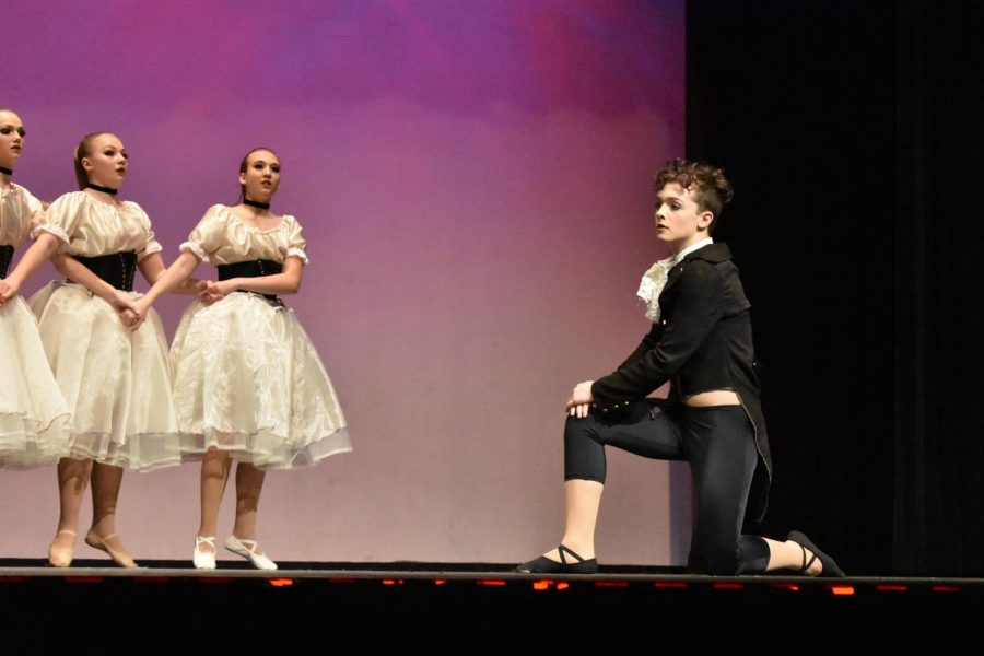 Sophomores Haylie Steinkraus, Makenna Allison and freshman Joshua Pena preform at a dance recital in Chelsea, describing a painting by Edgar Degas, a French painter from the mid-1800s who frequently painted ballet dancers.