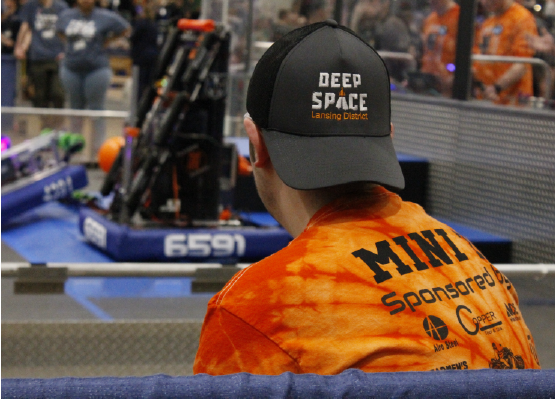 Senior Hunter Fee from team 6591 Panther Powered watches the robot at state competition in Saginaw University. As captain, I help them as soon as I can, and think captain means that I have enough skills to help make the team be more successful, Fee said.