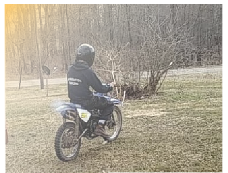 Eighth grader Connor Allen rides his dirt bike on loose ground in Grass Lake.