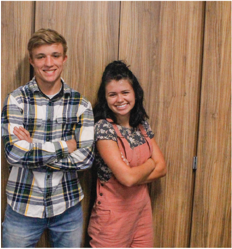 Junior Micah Beauregard and Senior Shelbey Sprout throwback to the early 90s style with overalls, stonewashed, ripped jeans, and plaid flannel.