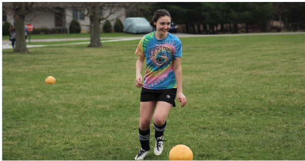 Sophomore+Malena+Rosedale+practices+shooting+goals+and+dribbling+in+the+practice+soccer+field+for+her+upcoming+soccer+game.+Communicating+with+other+teammates+with+a+smile+and+building+up+to+kick+for+a+clean+pass.+My+goal+is+not+about+winning+to+build+a+better+program+so+that+when+we+are+seniors+it+will+be+a+thing+others+want+to+do.+Rosedale+said.+