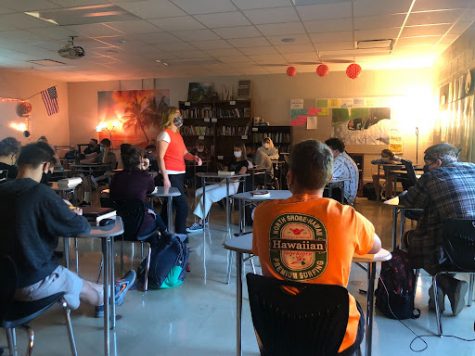  Jessica Martell teaches her 9th grade English class, as students actively engage in the lecture. All together, there are 90 students in the class of 2025.
