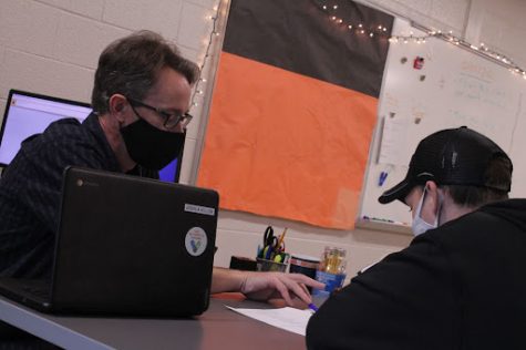 While working with academic support student Trevor Poole, teacher Joshua Killom explains a tough government assignment. Killom’s classroom is a friendly environment that helps students learn and work through their struggles. 