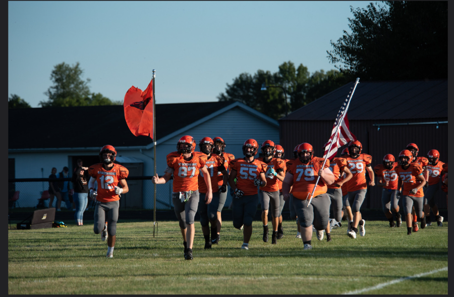 The panthers run out to begin the game against Ypsilanti.