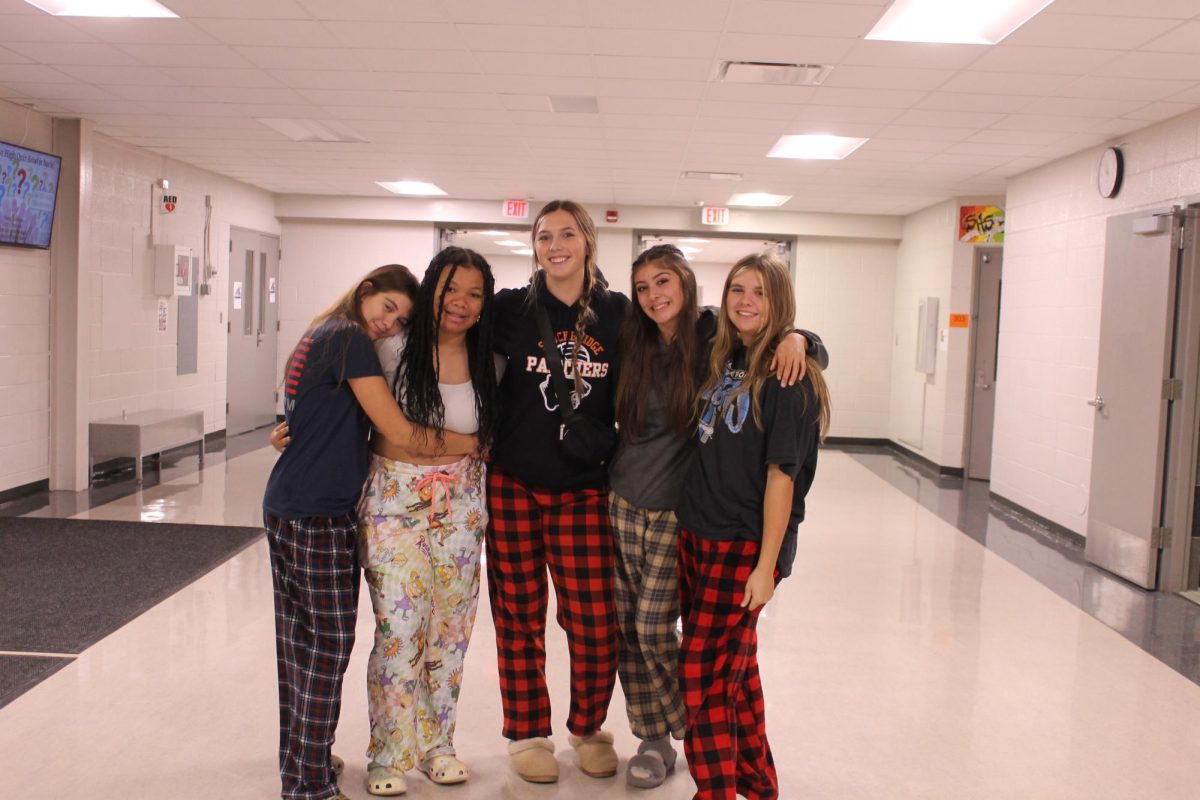 Sophomores Alecia Smith, Infinity Bills, Chyanne Lindquist, Melina Sayer and Airiana Smith show off their pajama pants in the hallways.