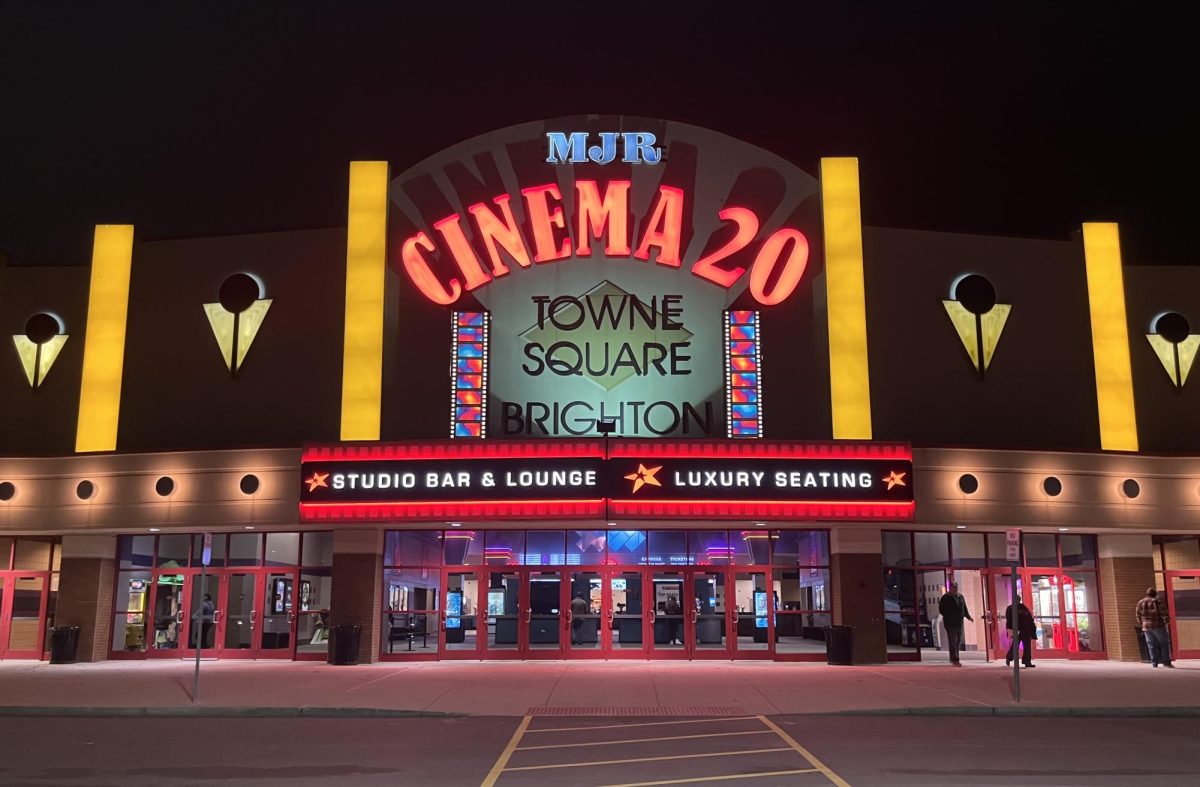 The+neon+lit+building+of+the+MJR+in+Brighton+is+a+popular+place+for+students+and+families+to+watch+newly+released+movies.