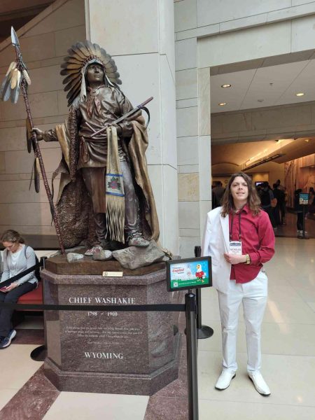 Nicholas Phillips stands next to a statue depicting Chief Washakie of the Shoshone people while touring the Washington D.C. museum. Photo provided by Nick Phillips