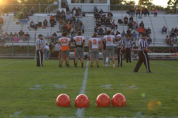 Stockbridge Varsity captains prepare for the coin toss against Quincy.